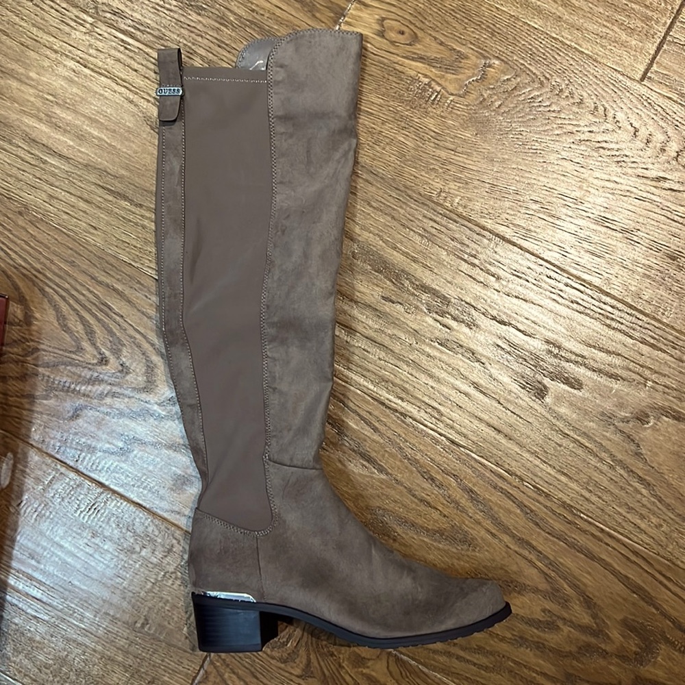 Stylish greyish brown boots from GUESS